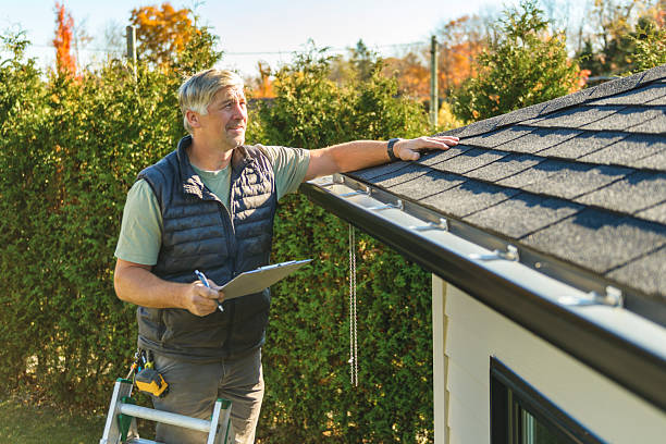 Professional Roofing technician working in Burton, MI